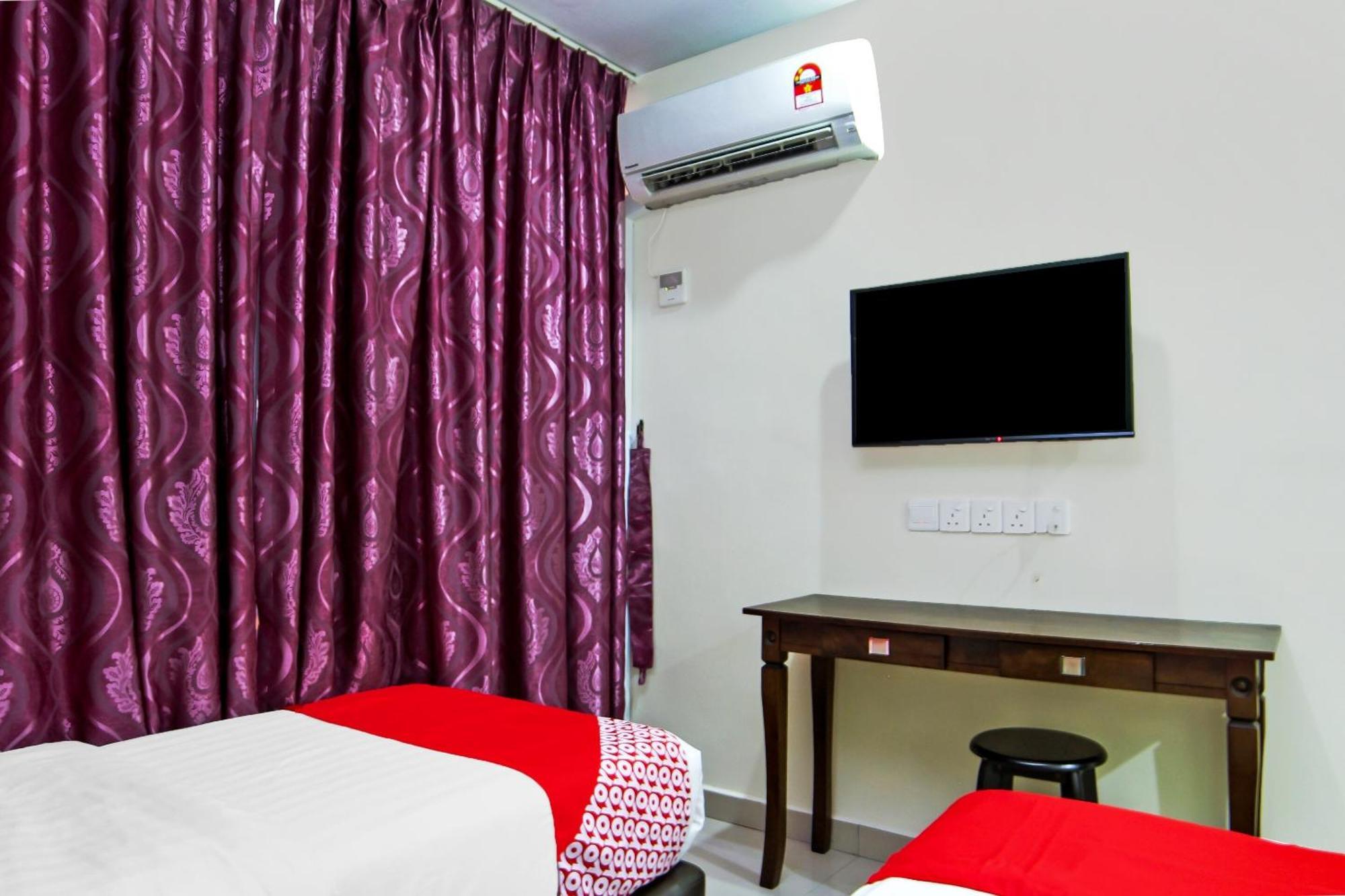 Oyo 44054 Holiday Mansion Inn Сибу Экстерьер фото
